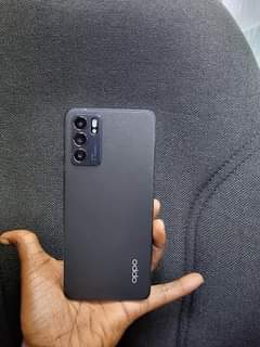 A picture of OPPO RENO 6 5G 980000 CALL WHATSAPP 0753531596 0783444414