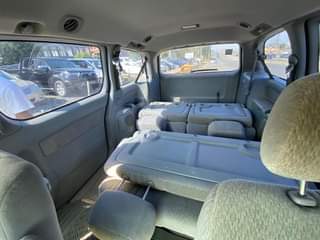 A picture of Distress Foreign Used 2003 model last batch Toyota Sienna with