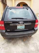 A picture of Used kia spotage at ojodu Berger area good engine and