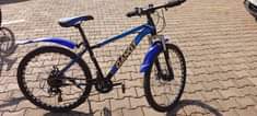 A picture of Mountain Sports Bicycle with Helmet