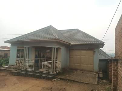 A picture of 90m Quick sale 90m busubuzi price House located at kawempe