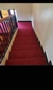 A picture of Wall to wall woollen carpets