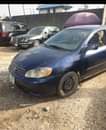 A picture of Dealers Deal 04 corrola painted with sound engine n gear