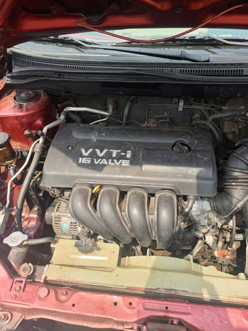 A picture of 2004 Toyota Corolla LE for sale price slashed Engine very