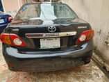 A picture of Toyota Corolla 08 painted engine gear AC perfect ok price