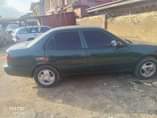 A picture of partial first body 2001 Corolla engine gear and AC in