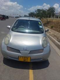 A picture of Nissan march new model nzuri mno full Ac matairi mpyaaa