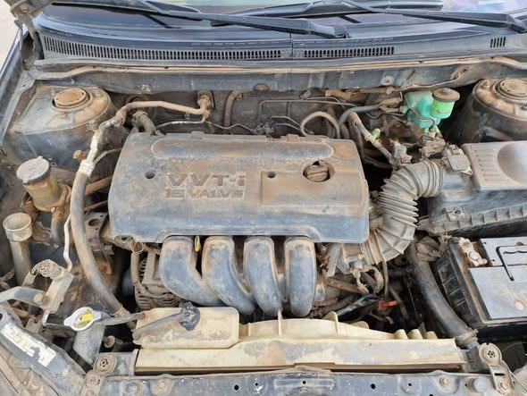 A picture of 2005 Toyota Corolla Untampered engine and gear AC is chilling