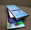 A picture of Samsung and iPhone