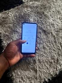A picture of Samsung galaxy A11 32gb. Slight cracks but looking neat at