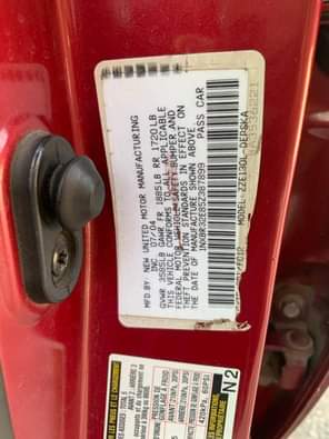 A picture of RED An Extremely Clean Used Toyota Corolla 2004 Model With
