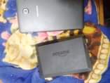 A picture of Samsung tablet and amazon WiFi tablet