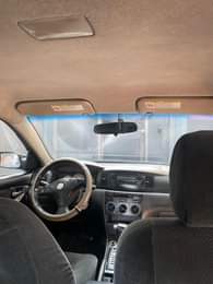 A picture of Toyota Corolla 2004 5 neatly flashed on first body everything