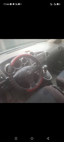 A picture of First body Toyota matrix engine and gear AC is working