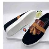 A picture of Men s sneakers and shoes Available in sizes 40 46
