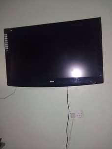A picture of Tv lg 43 radio old model panasonic and clubox woofer