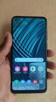 A picture of Cracked Samsung galaxy A11 in good working condition It s