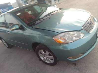 A picture of Awooof Toyota corolla 2004 model Engine and gear ok AC