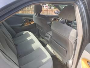 A picture of DISTRESS DISTRESS NEATLY USED 2009 TOYOTA CAMRY XLE WITH BACK