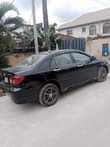 A picture of Toyota Corolla 2004 Engine Ac Gear Painted on first body