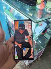 A picture of Samsung galaxy not 9 with 128GB storage 350k last in