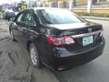 A picture of 2012 Toyota Corolla first body pan no Nigeria paint Price