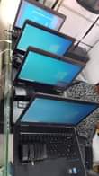 A picture of New and used laptops and computers plus printers
