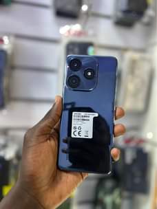 A picture of Tecno spark 10C 128gb 8gb ram clean 420k WhatsApp or