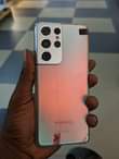 A picture of Cracked samsung s21 utra 128gb storage 12gb ram 800k negotiablecall