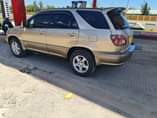 A picture of 2002 harrier gold colour sports