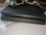 A picture of CHIPPED SLIM GOOD AS NEW WIT 2 ORIGINAL PADS 7GAMES