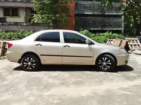 A picture of 2004 TOYOTA COROLLA TOKS STANDARD FIRST BODY.