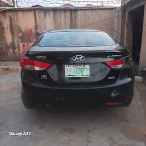 A picture of Cash needed urgently for this 2012 Hyundai Elantra painted once