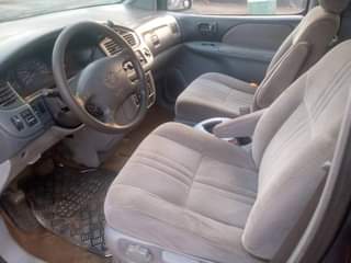 A picture of NEATLY USED 2002 TOYOTA SIENNA