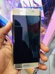 A picture of GALAXY S6 EDGE. AT 170000.