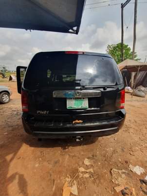 A picture of Clean Nigerian Used Black Honda Pilot 2008 Repainted on First