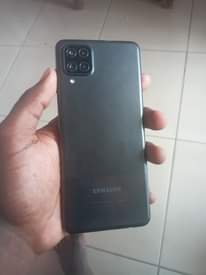 A picture of Samsung a12 aina kipengele chaji inakaa sana camera clean 0620490740