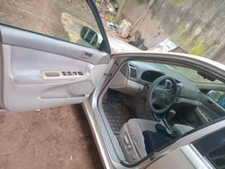 A picture of Toyota Camry 2004 model 4plugs FIRSTBODY Perfectly working and very
