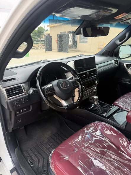 A picture of Foreign used 2020 Lexus GX460 White on red 33 000