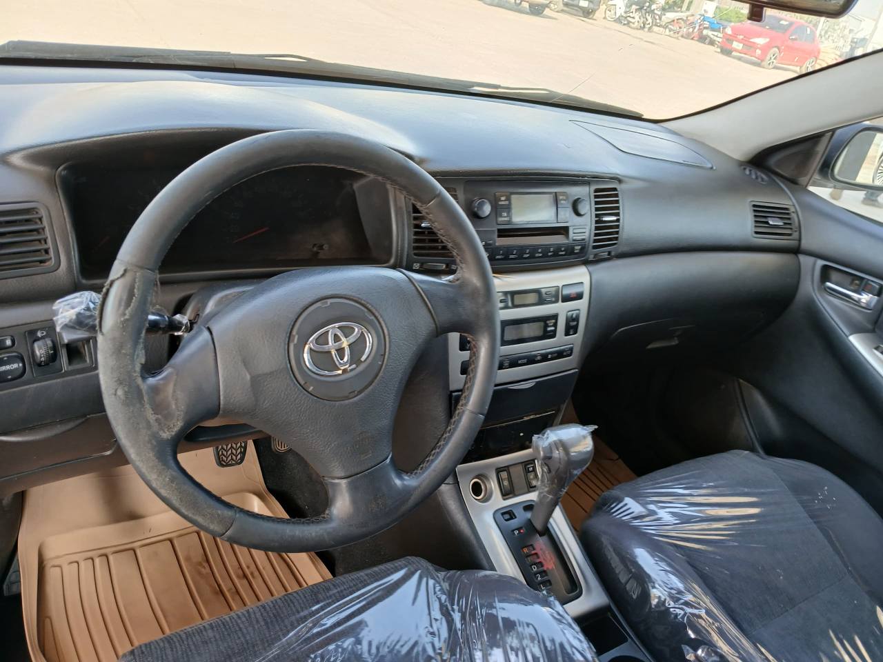 A picture of  09018042178 FOR SALE EXTREMELY CLEAN USED TOYOTA COROLLA OBAMA