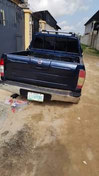 A picture of Give me 2 5m and take it Nissan pick up