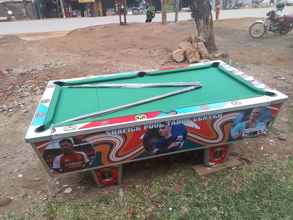 A picture of A NEW POOL TABLE with a slate marble