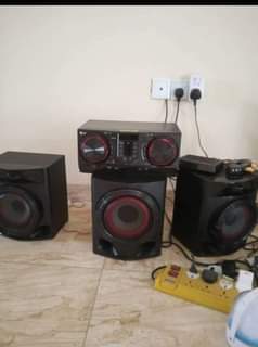 A picture of 43inch Hisense and LG xboom home theater
