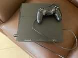 A picture of Sony Ps 4 with FIFA 2022 spider man and call