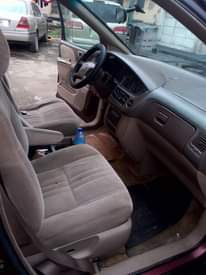 A picture of 2002 Toyota sienna oven backed on pure first body pan