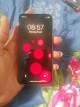 A picture of IPhone x 64GB with face id 100 battery health