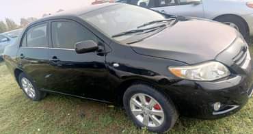 A picture of Naija used 2010 Toyota Corolla untampered engine and gear AC