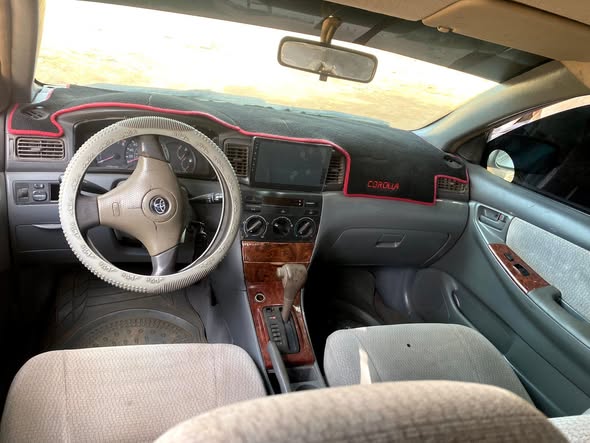 A picture of Sharp Dealers deal 2004 Toyota Corolla With untempered engine and