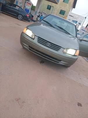 A picture of Toyota camry 2001 model. Perfectly working. Buy and travel with