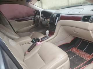 A picture of Registered Lexus Es330 Engine gear and AC Android screen First